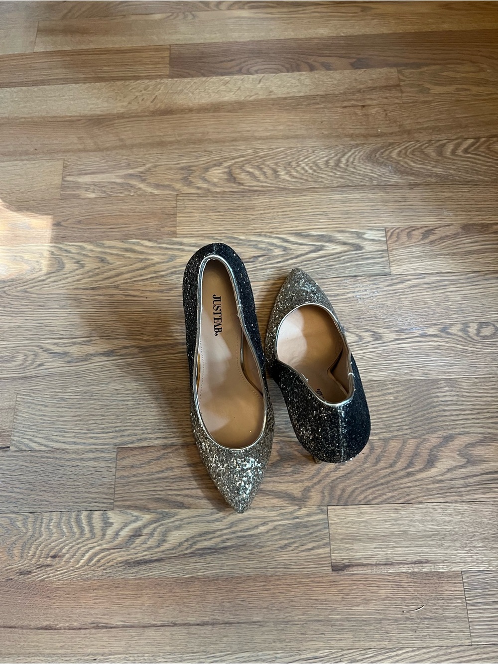 JustFab Two-Tone Glitter Pointed Heels in Black and Gold
